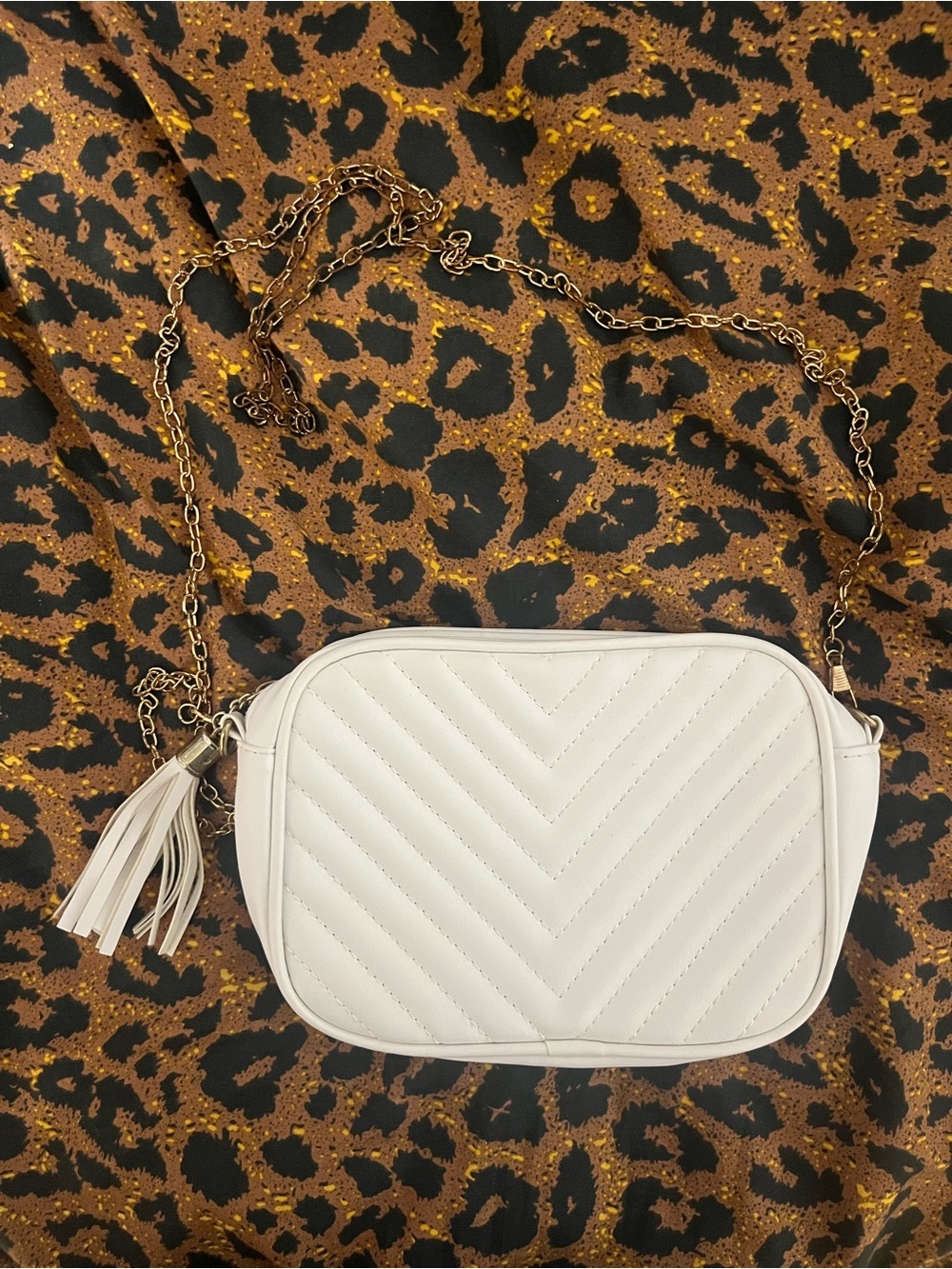 Quilted White Crossbody Bag with Tassel Detail